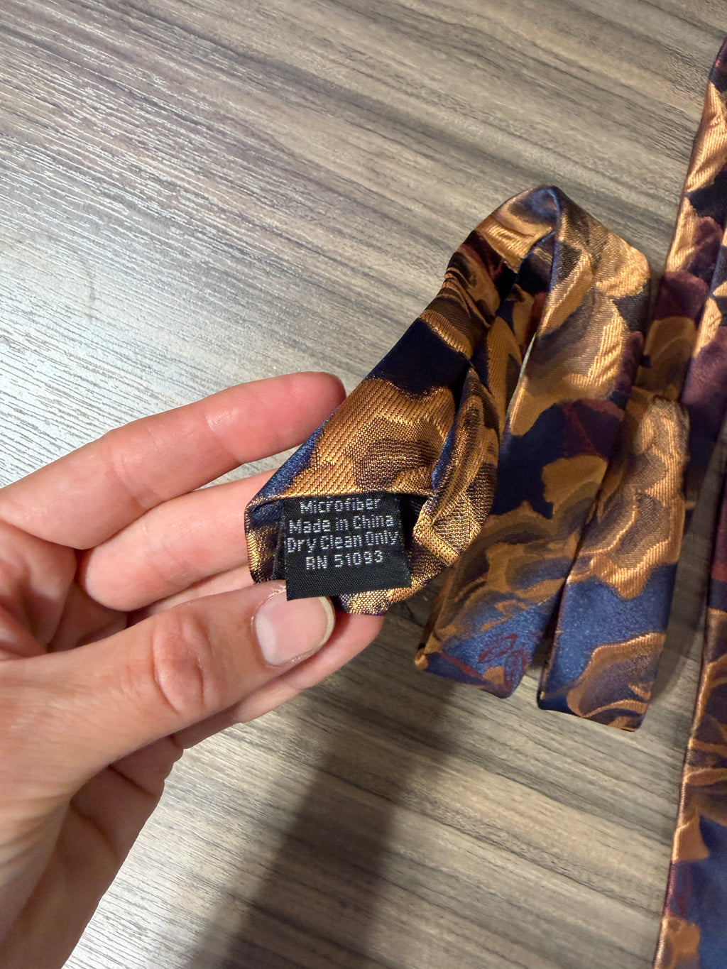 Blue and gold floral-patterned microfiber necktie