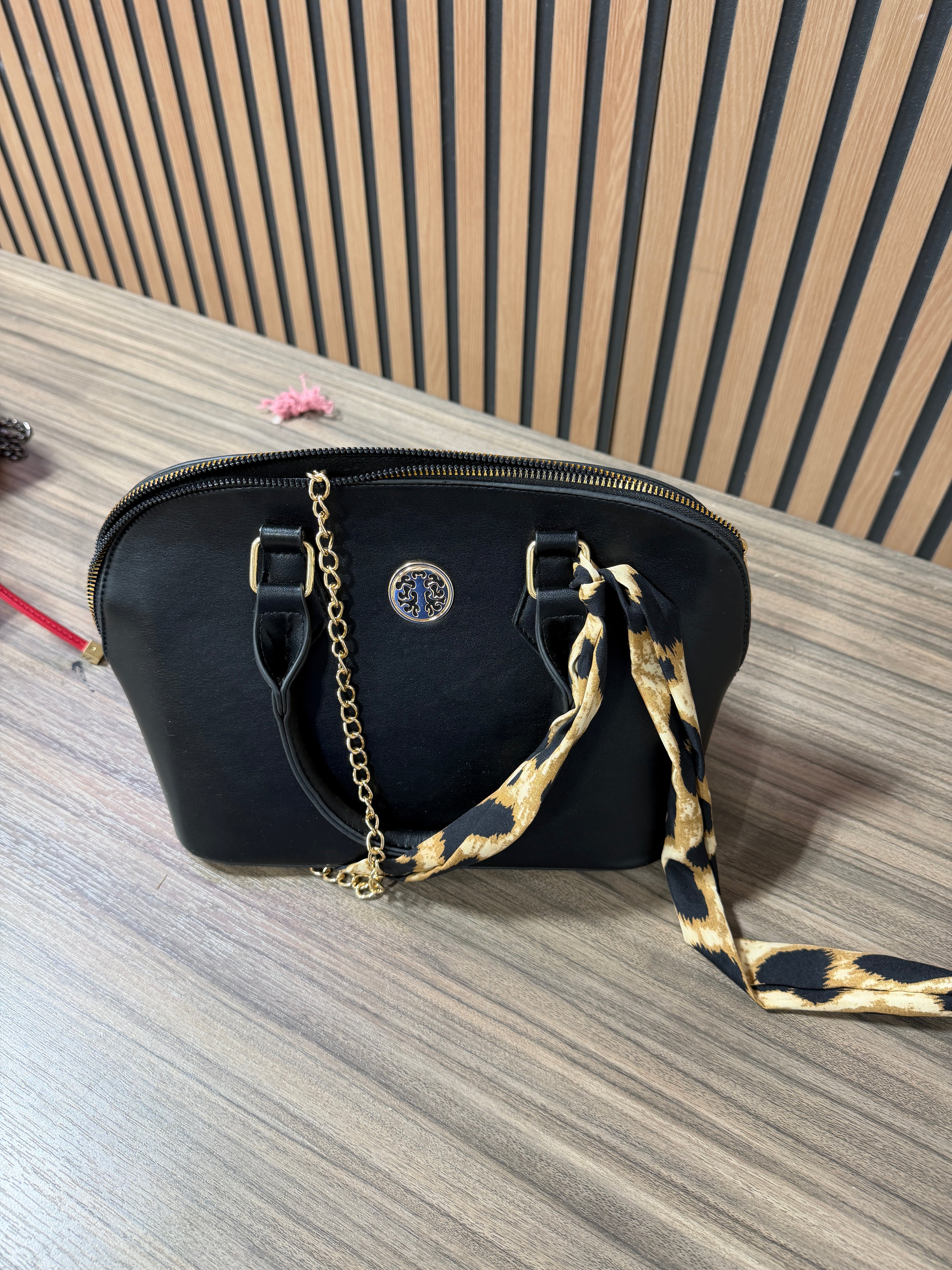 Linea Donna black dome-shaped satchel handbag