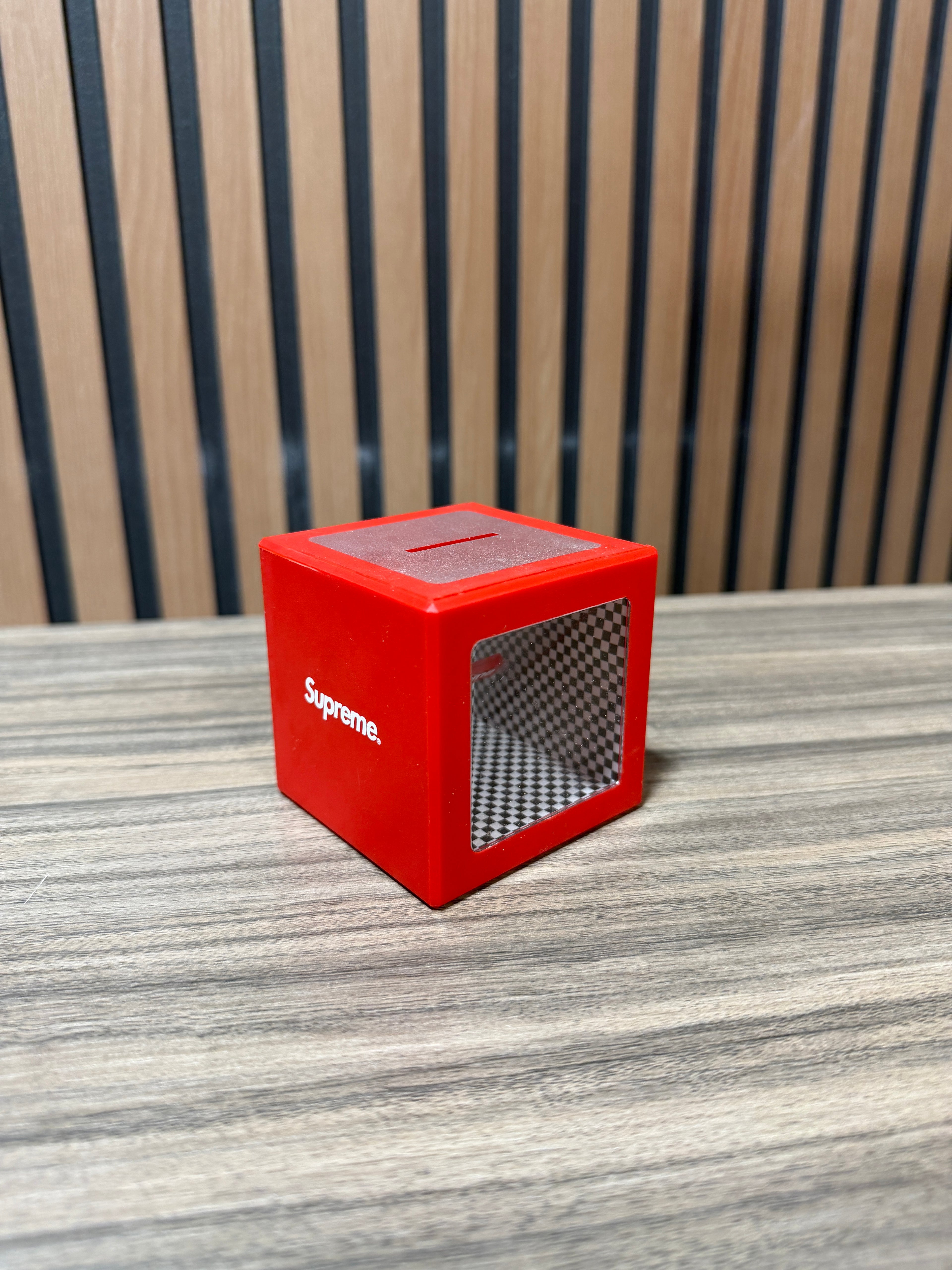 Supreme Illusion Coin Bank