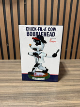 Load image into Gallery viewer, Chick-fil-A Cow Bobblehead Atlanta Braves Giveaway 8/20/24
