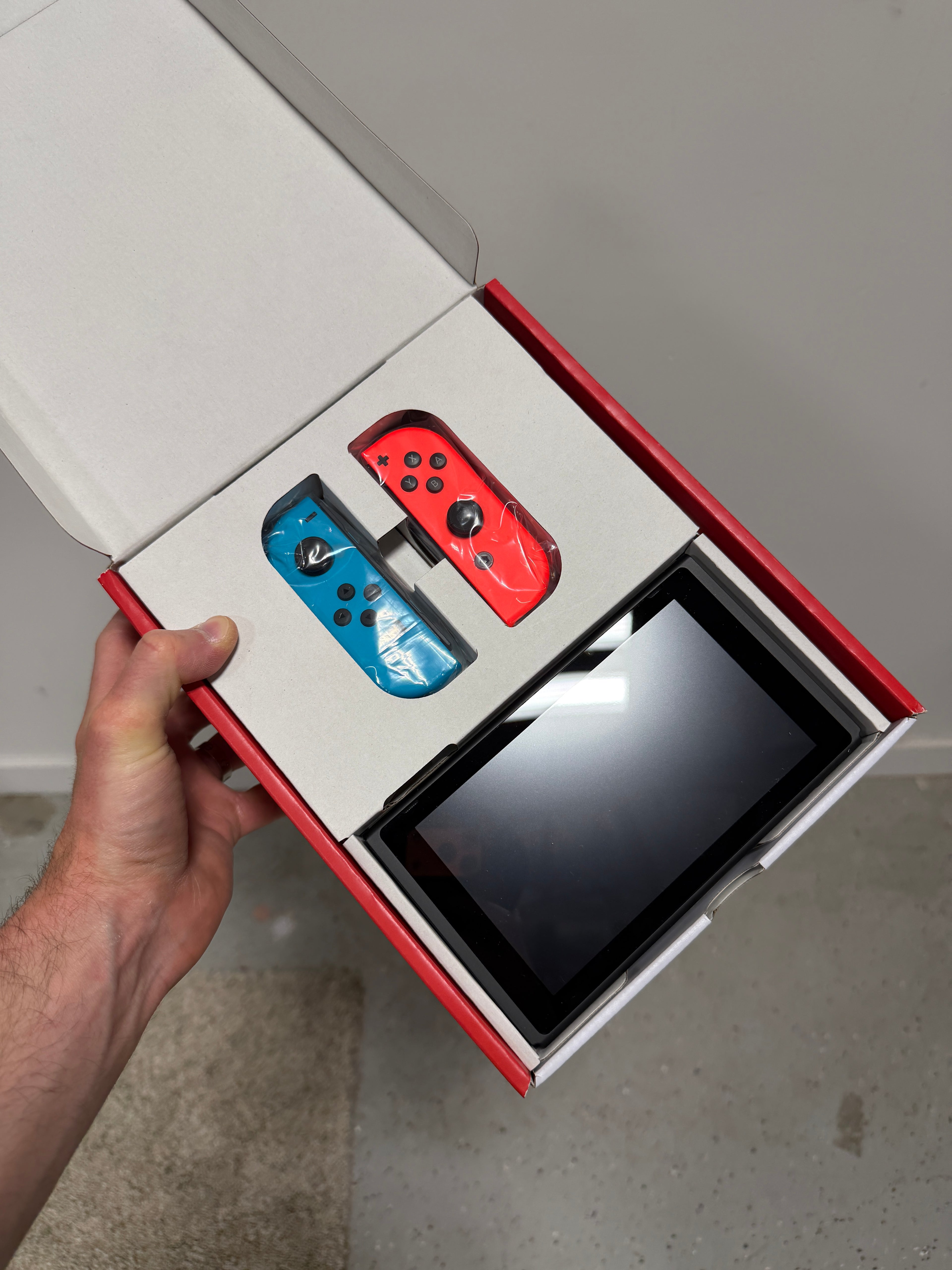 Nintendo Switch Console with Blue and Red Joy-Con Controllers W/ Case & Cable