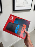 Nintendo Switch Console with Blue and Red Joy-Con Controllers W/ Case & Cable
