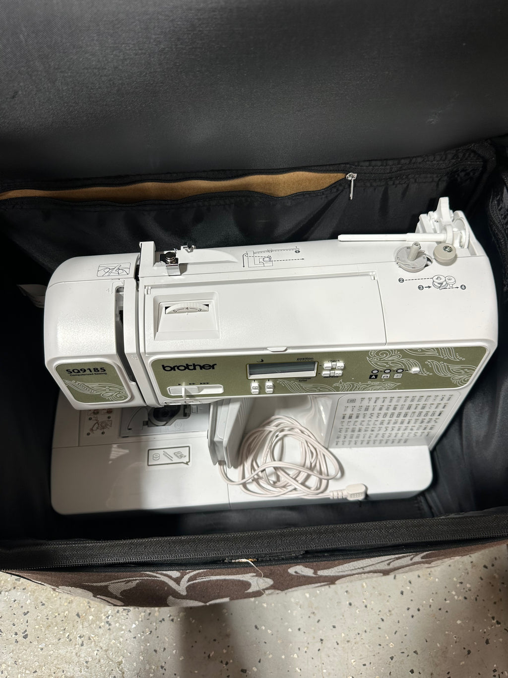 Brother SQ9185 Computerized Sewing and Quilting Machine in carrier