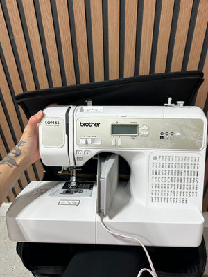Brother SQ9185 Computerized Sewing and Quilting Machine in carrier