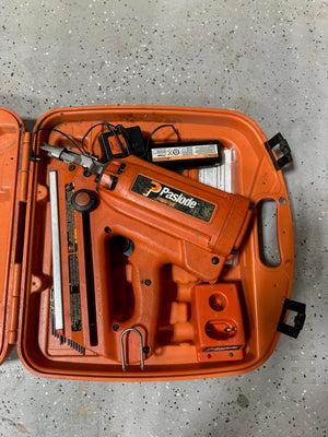 Paslode Impulse 30-Degree Cordless Framing Nailer stored in its matching hard-shell case