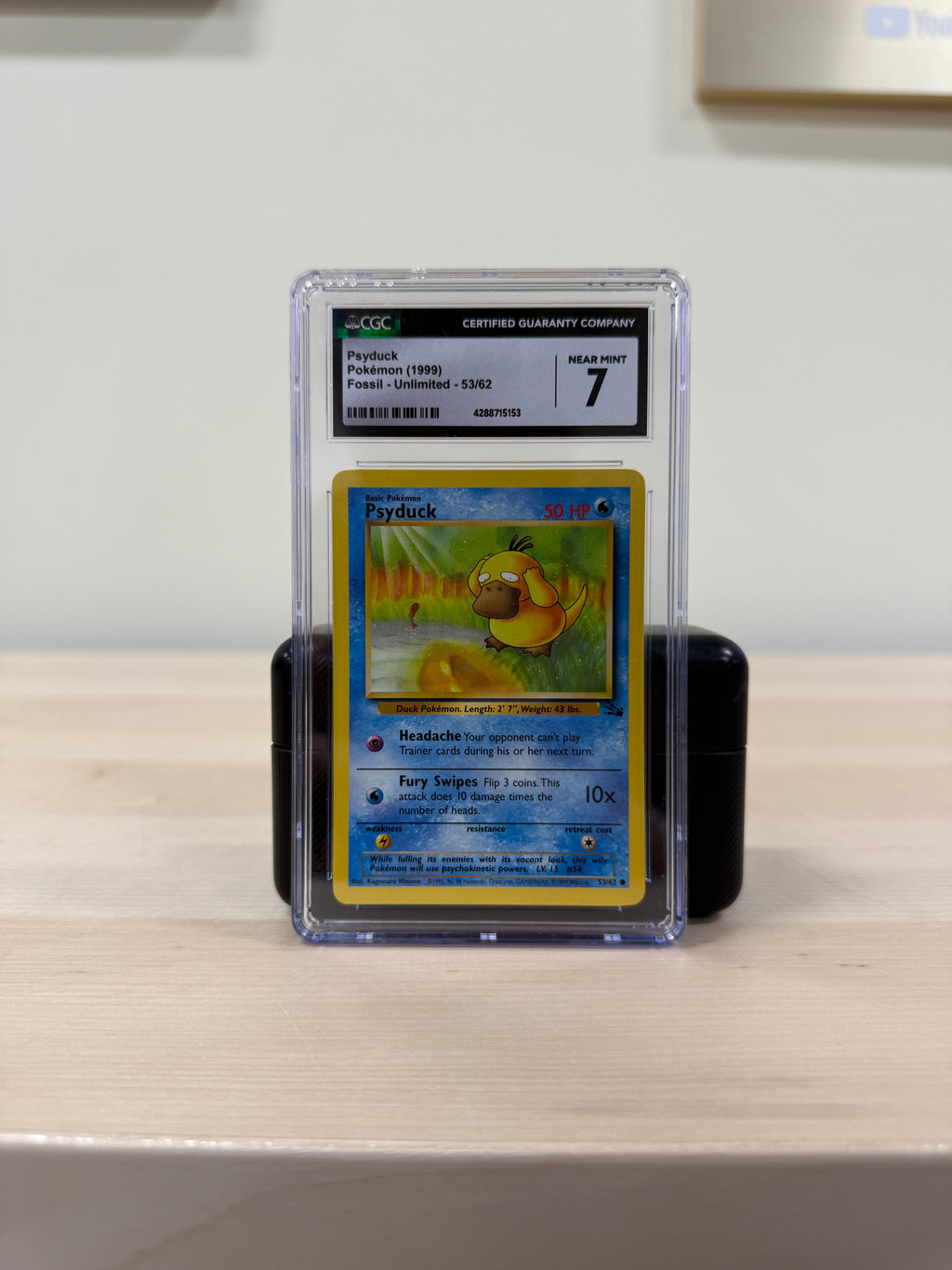 Psyduck Pokemon Card Grade 7