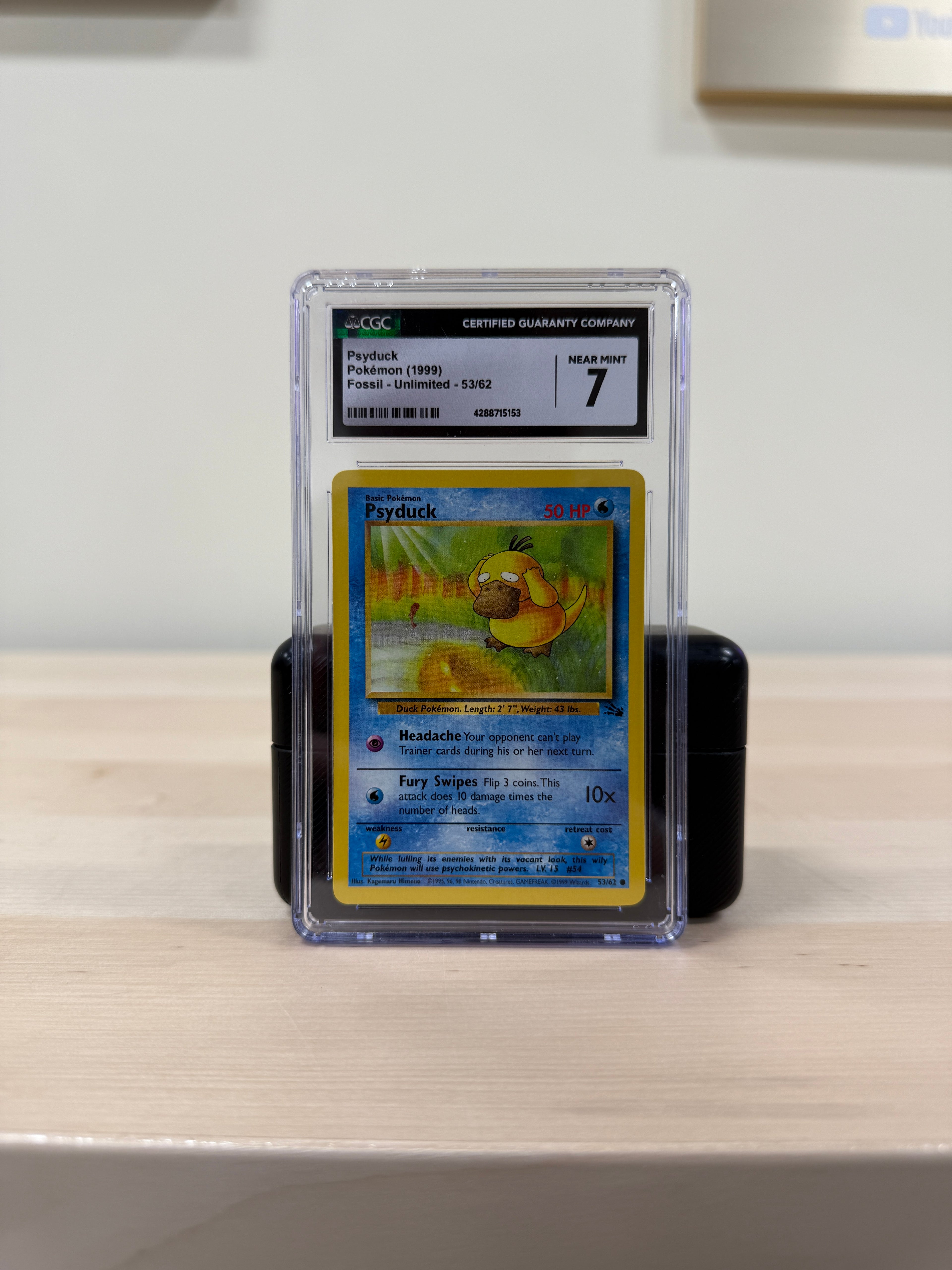 Psyduck Pokemon Card Grade 7