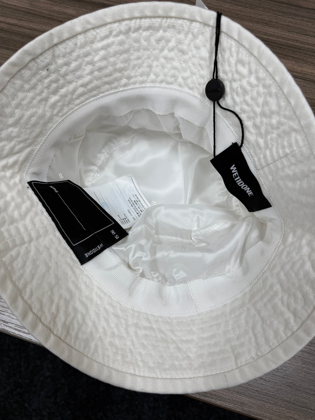 WE11DONE White Logo Bucket Hat