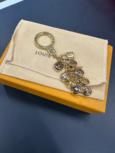 Load image into Gallery viewer, Louis Vuitton Brown Charms Keychain

